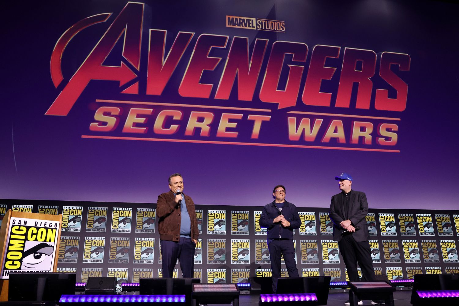 Feige and Russos with Avengers 6 logo