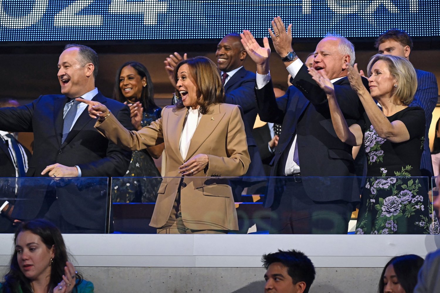 US Second Gentleman Douglas Emhoff, US Vice President and 2024 Democratic presidential candidate Kamala Harris, Minnesota Governor and 2024 Democratic vice presidential candidate Tim Walz and his wife Gwen Walz attend the first day of the Democratic National Convention (DNC) at the United Center in Chicago, Illinois, on August 19, 2024.