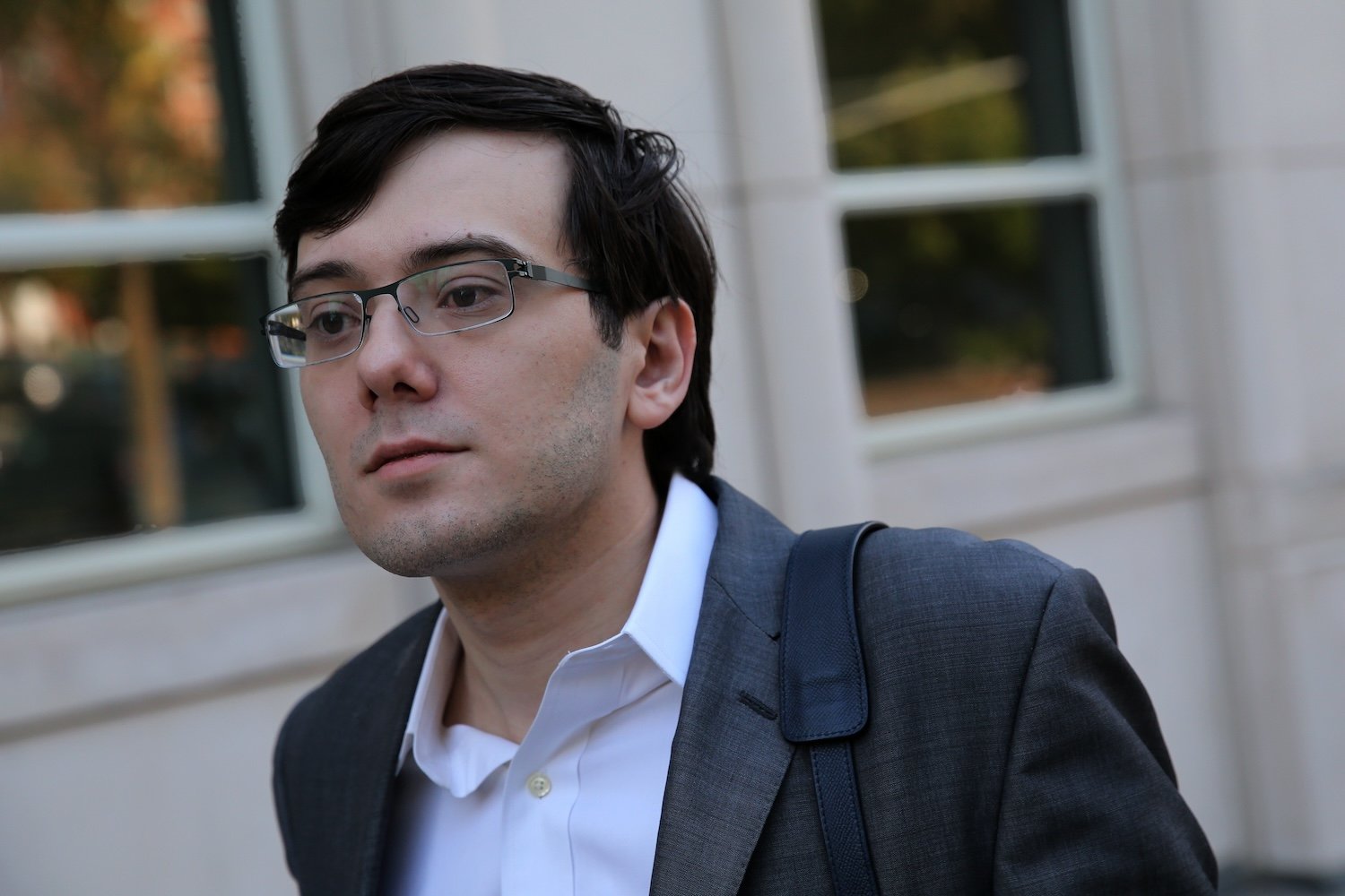 Martin Shkreli, former chief executive officer of Turing Pharmaceuticals AG, arrives at federal court in the Brooklyn borough of New York, U.S., on Thursday, Aug. 3, 2017.