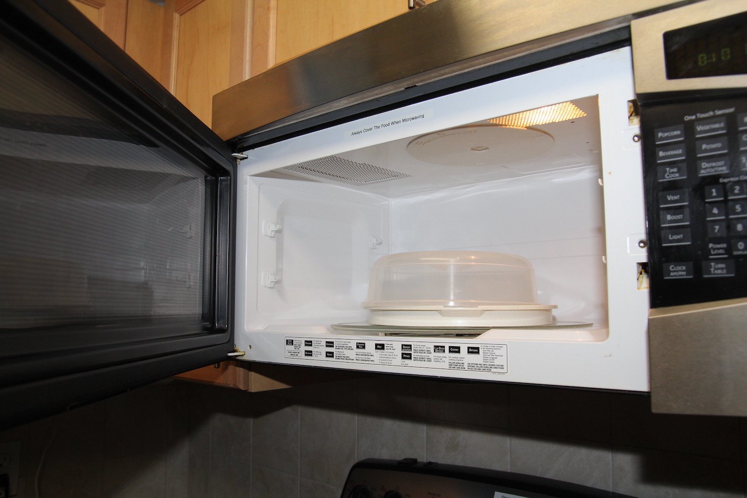 A picture of a microwave with door open