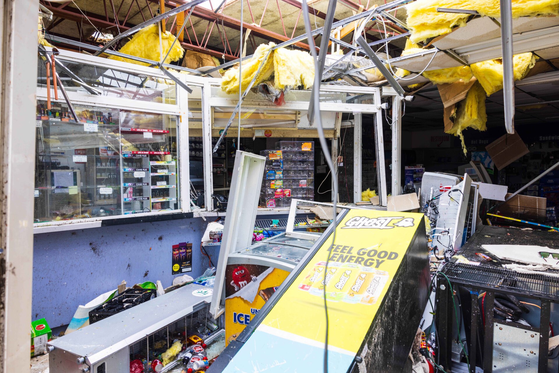 The inside of a mini mart of a local gas station is left damaged by a tornado caused by Hurricane Milton, on October 10, 2024 in Port St Lucie, Florida.