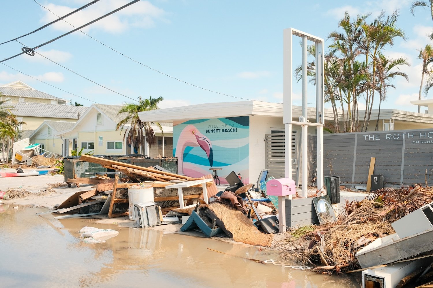 Debris in front of buildings after Hurricane Milton in St. Pete Beach, Florida, US, on Thursday, Oct. 10, 2024. More than 3 million people are without power as of Thursday morning, after Hurricane Milton made landfall and crossed the state. Photographer: Tristan Wheelock/Bloomberg via Getty Images